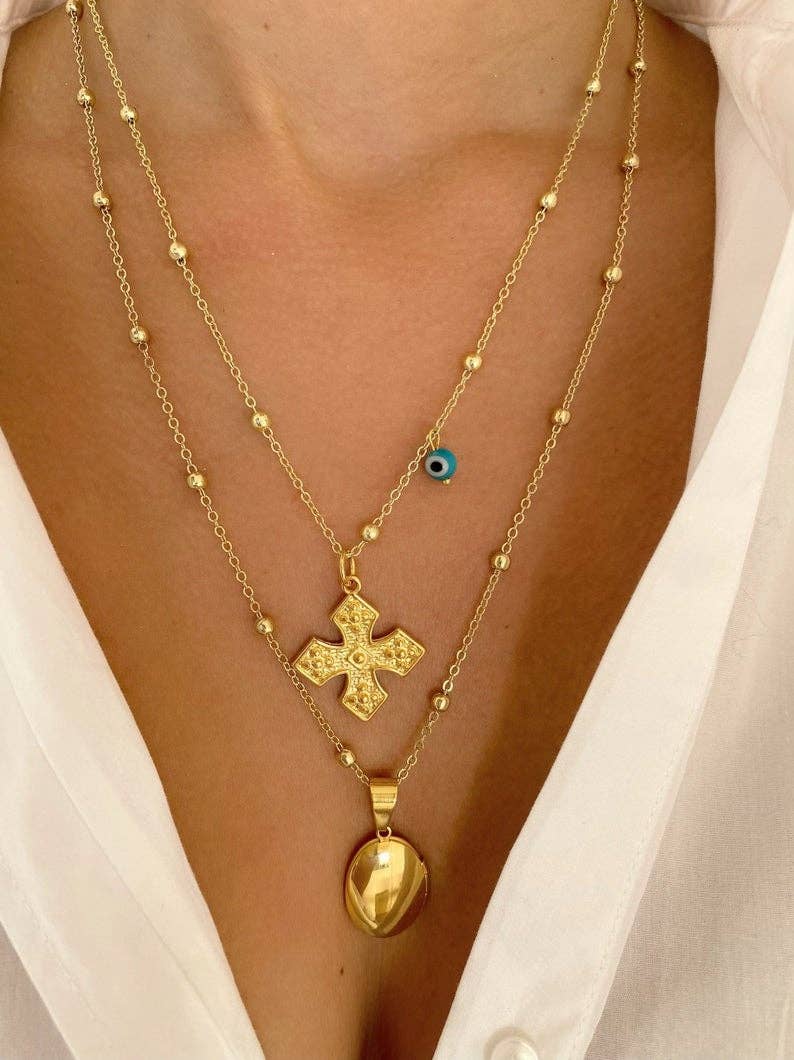 Evil Eye Cross Necklace 70.00