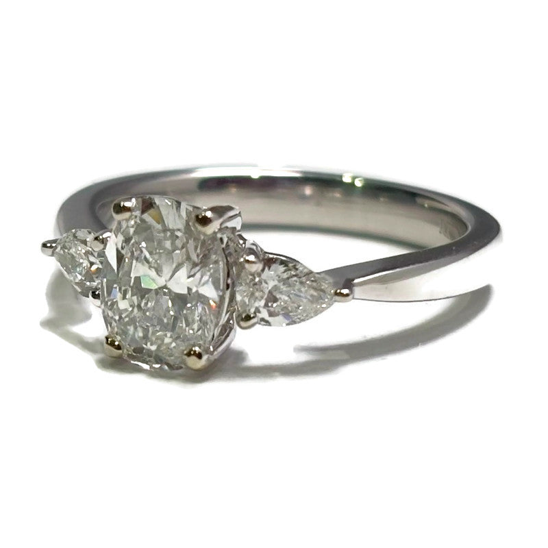 3 Stone Oval and Pear Diamond Engagement Ring in White Gold 2940.00