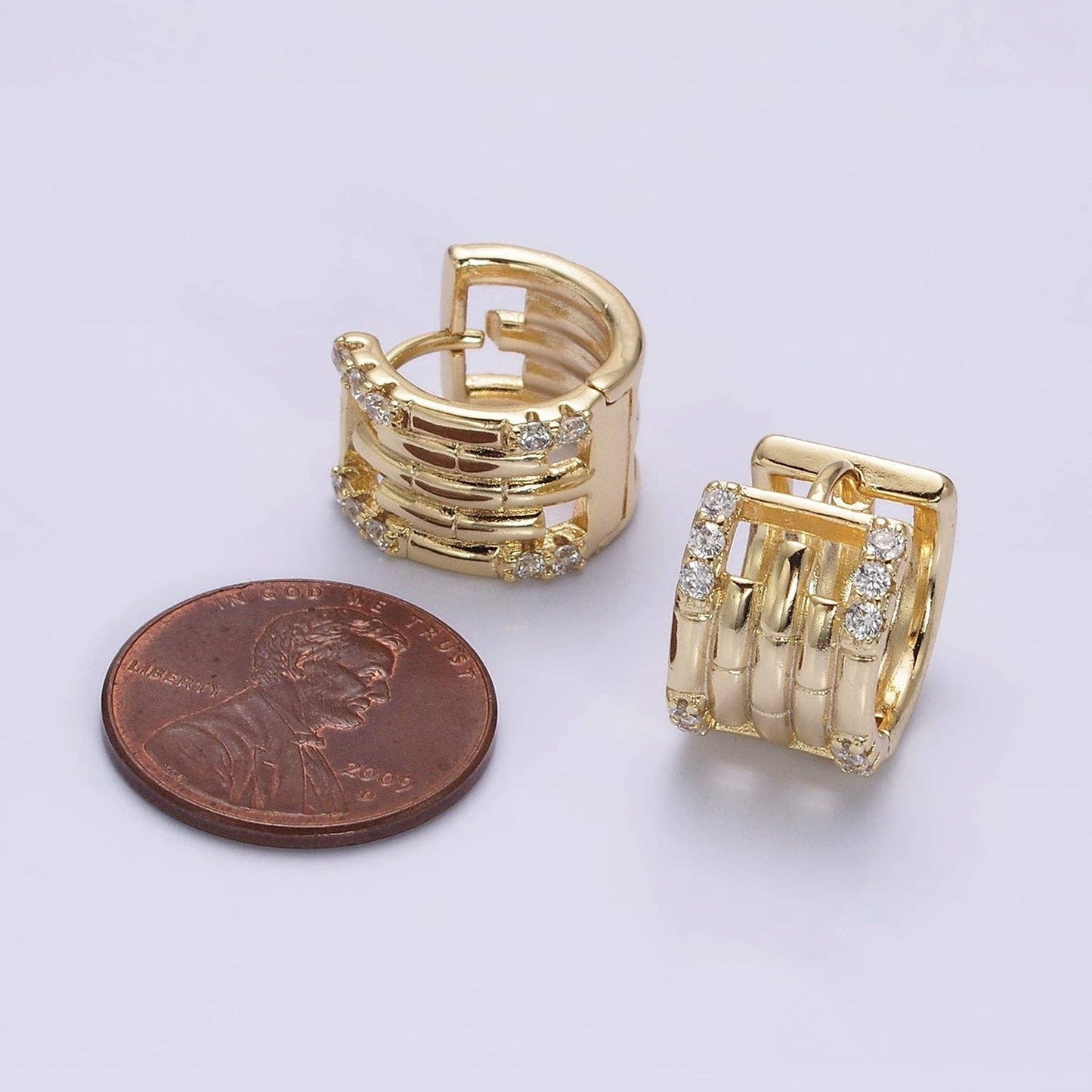 CZ Lined Multiple Band Bamboo Hoop Huggie Earrings 75.00