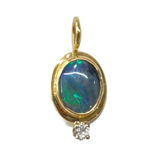 Black Opal and Diamond Gold Pendant 500.00
