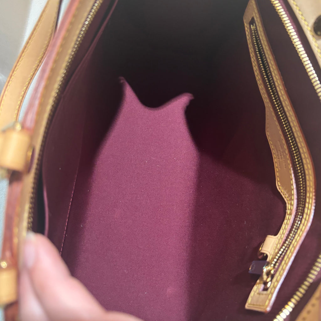 LV A Condition Vernis Brea MM Amarante 1600.00
