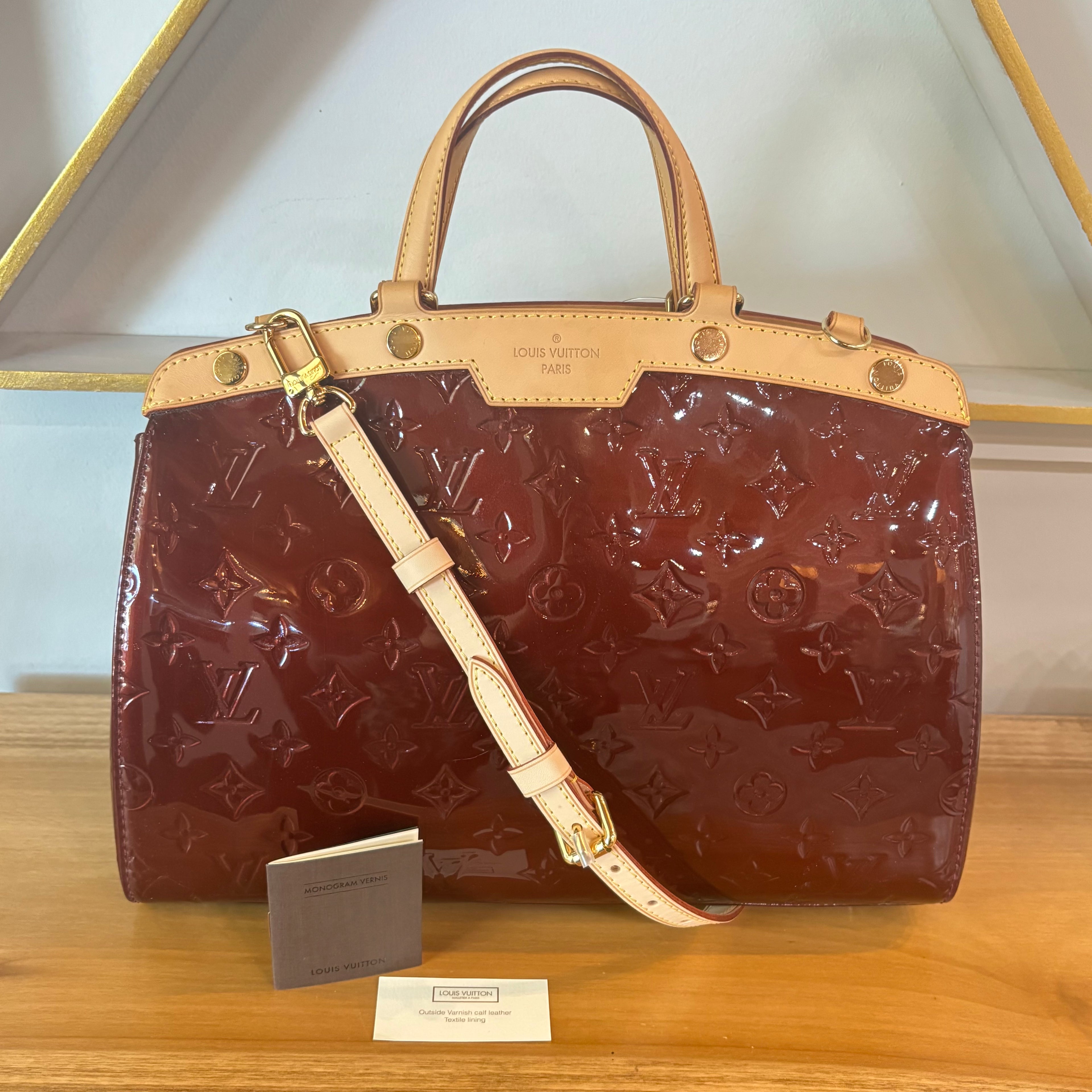 LV A Condition Vernis Brea MM Amarante 1600.00