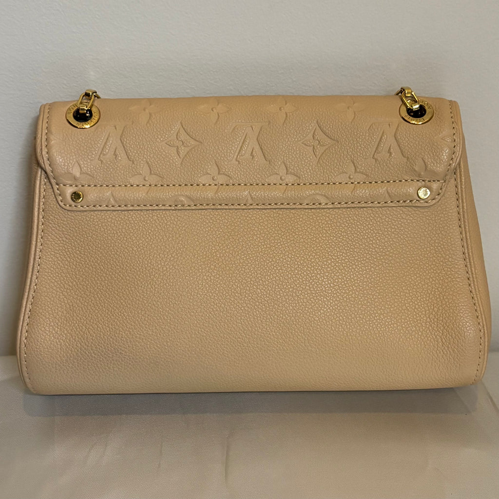 Louis Vuitton A Condition Empriente Saint Germain Beige PM 3500.00