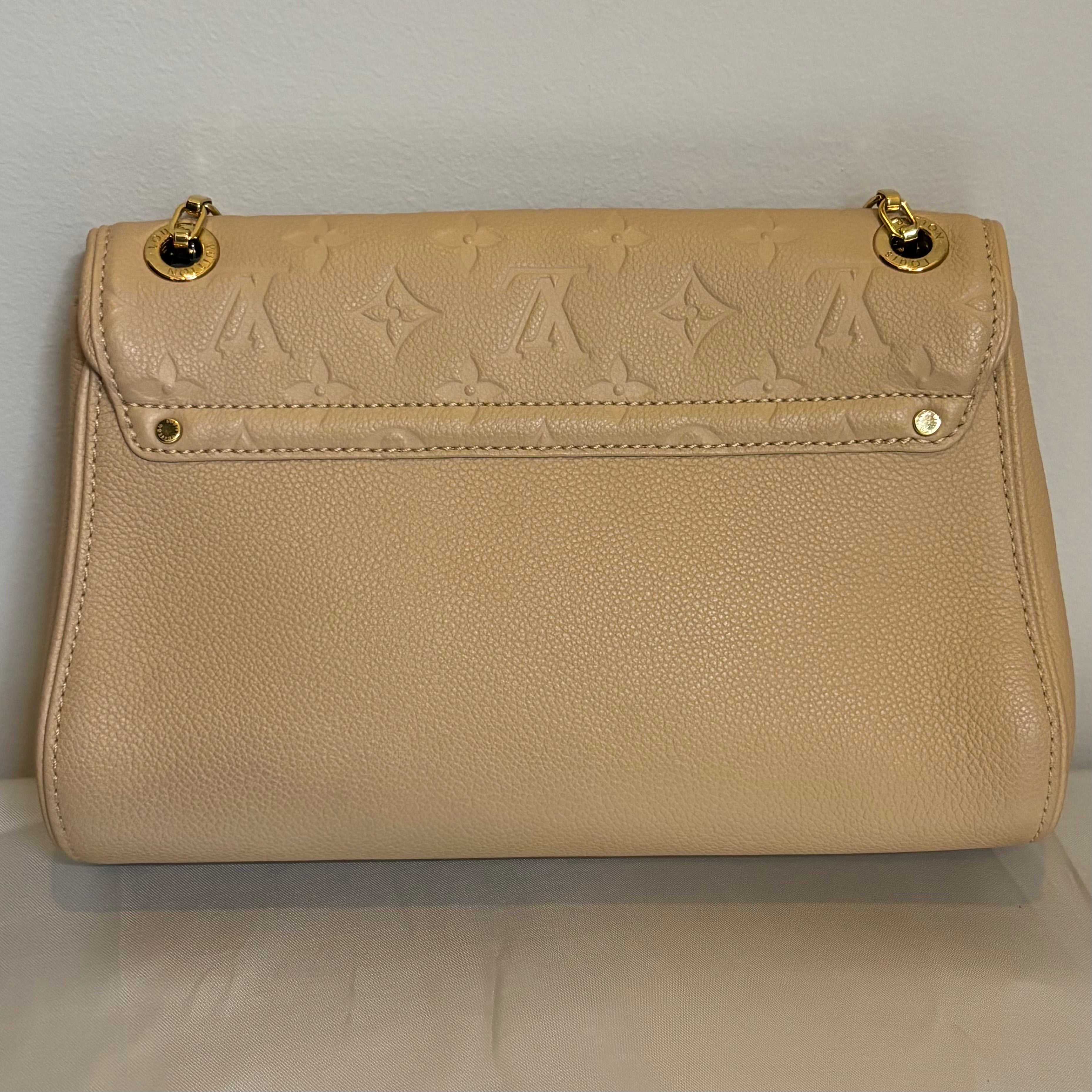 Louis Vuitton A Condition Empriente Saint Germain Beige PM 3500.00
