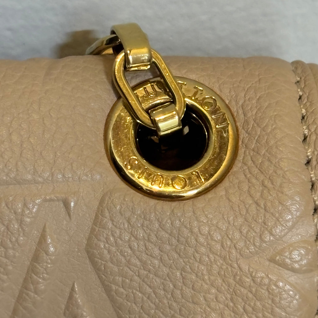 Louis Vuitton A Condition Empriente Saint Germain Beige PM 3500.00