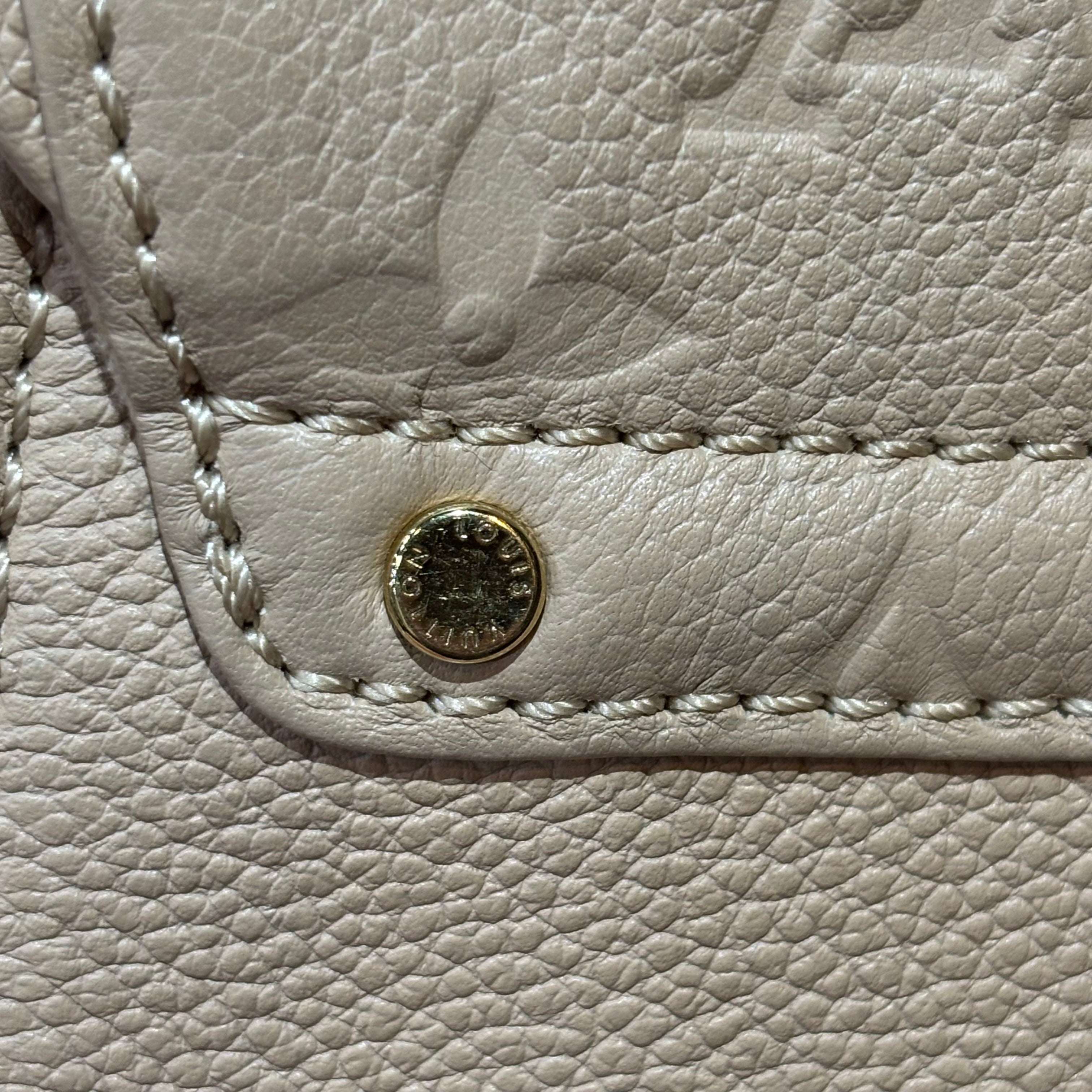 Louis Vuitton A Condition Empriente Saint Germain Beige PM 3500.00