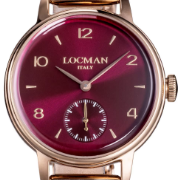 Locman Watch with rose gold mesh band and red dial on a white background