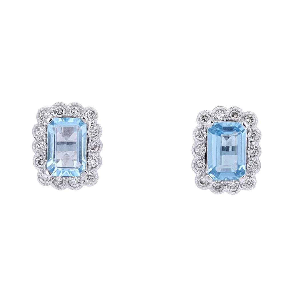 A pair of aquamarine and diamond earrings set in white gold with a classic emerald cut design.
