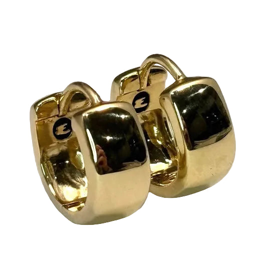 A pair of chunky gold hoop earrings against a white background.