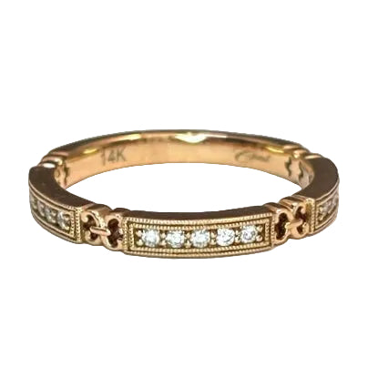 A rose gold band with diamond accents, featuring a textured design and branded with '14K'.