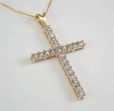 Diamond & 10k Gold Cross Necklace 850.00