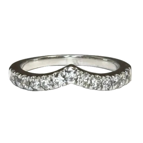 white gold diamond accented ring with sharp curve in the band.