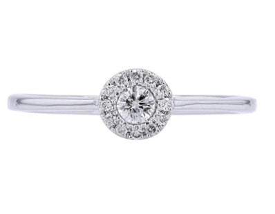 Diamond halo ring on a white background